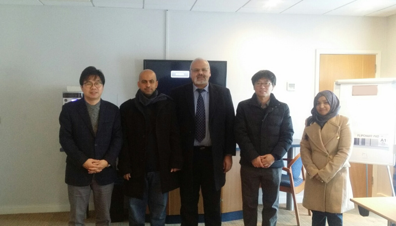 [group photo with giant cheque]